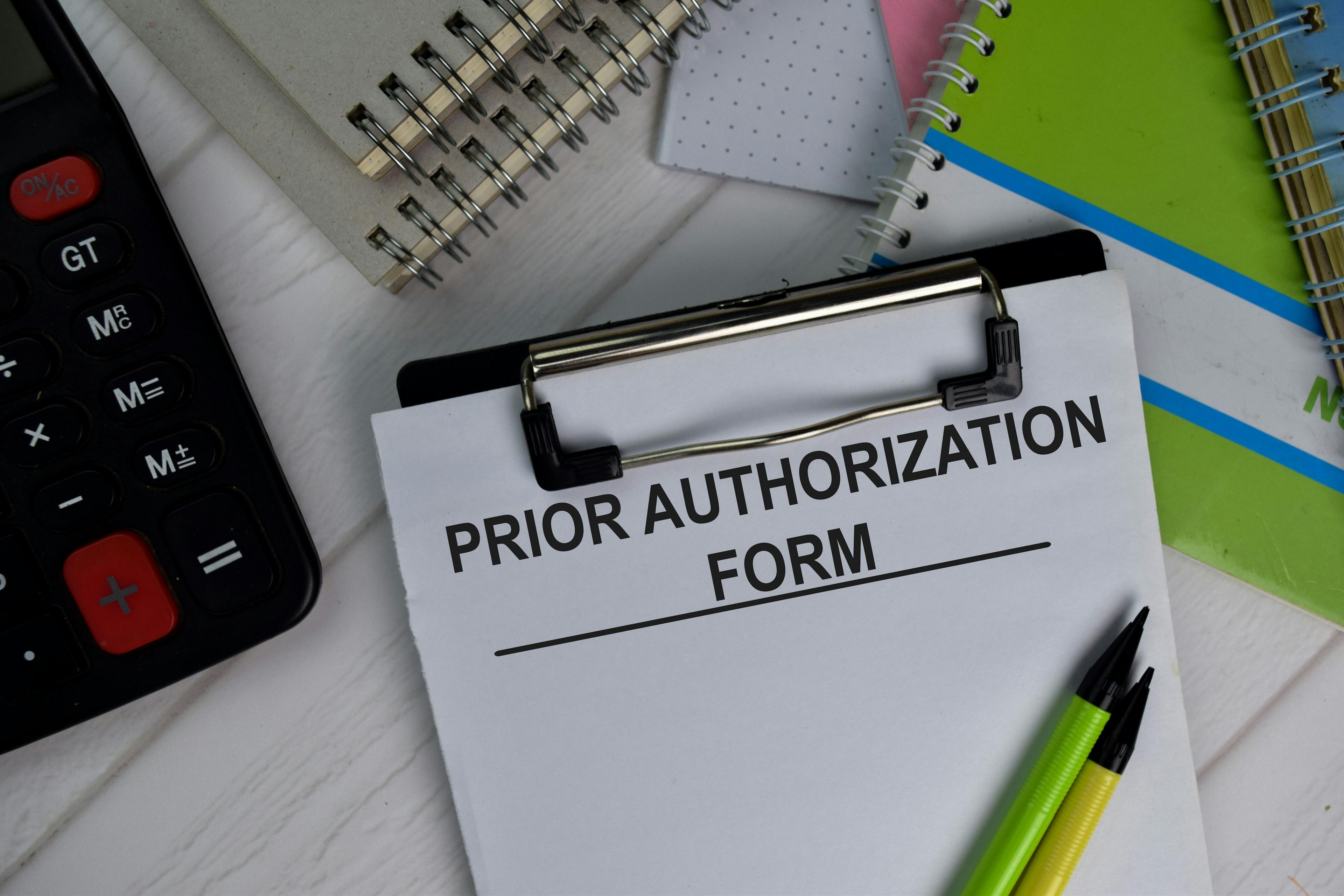 Form on clipboard that says prior authorization form | Image credit: © syahrir stock.adobe.com