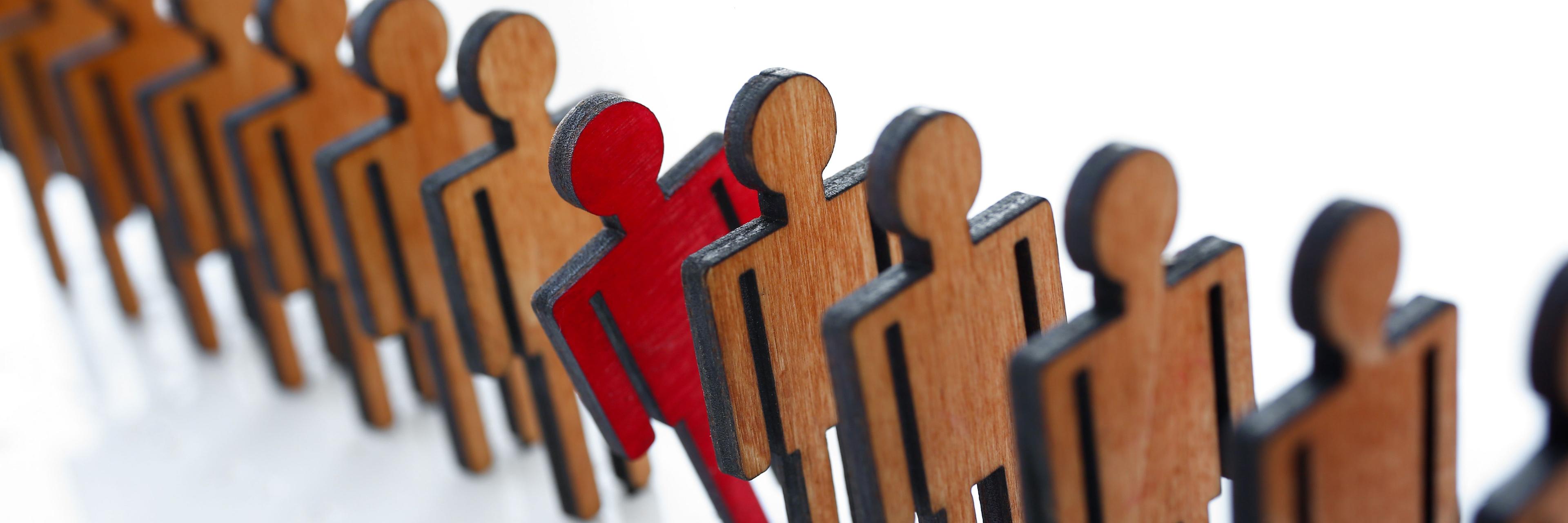 wooden figures with one red one | Image credit: ©H-Ko stock.adobe.com