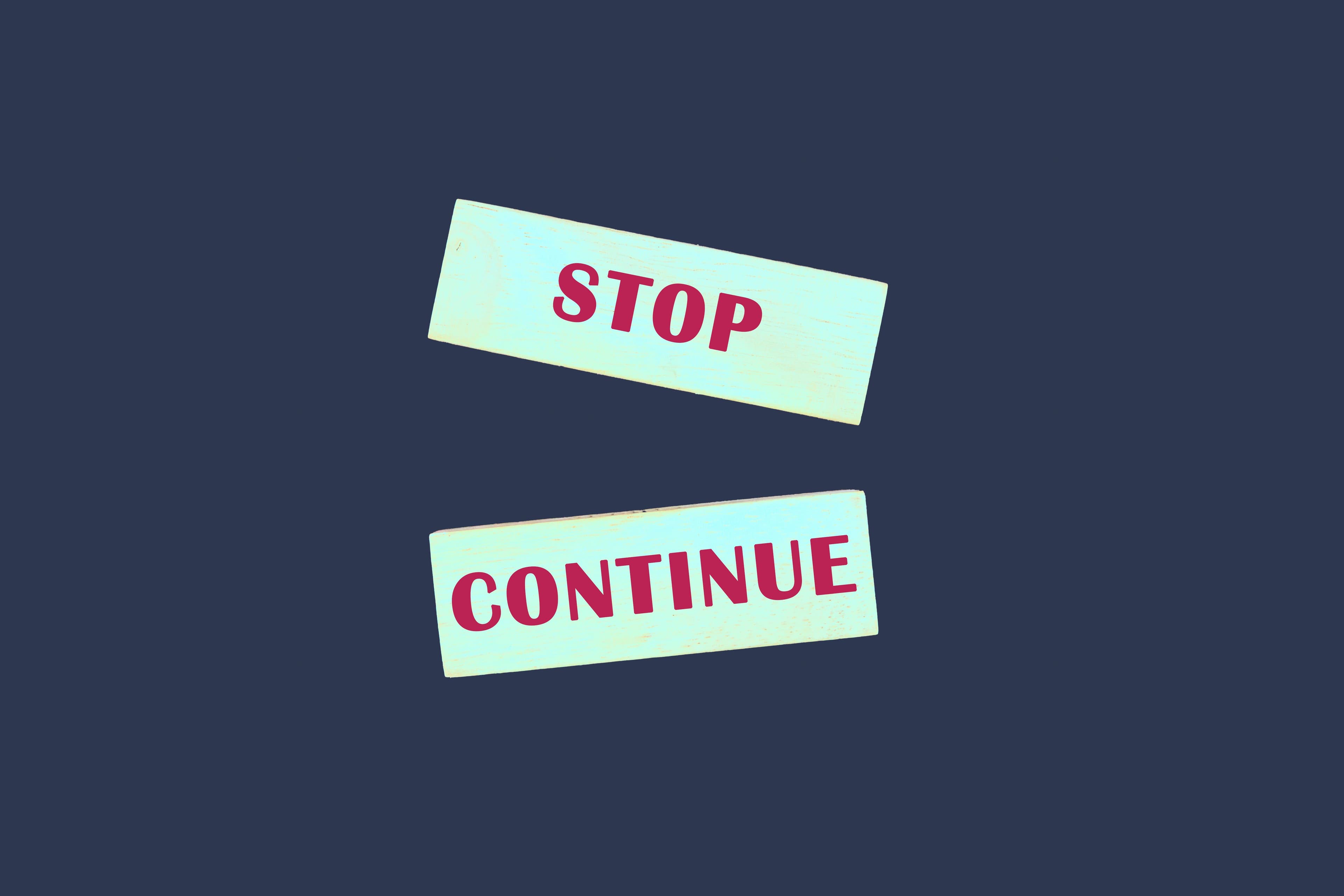 words stop and continue on blue background | image credit: ©ihar stock.adobe.com