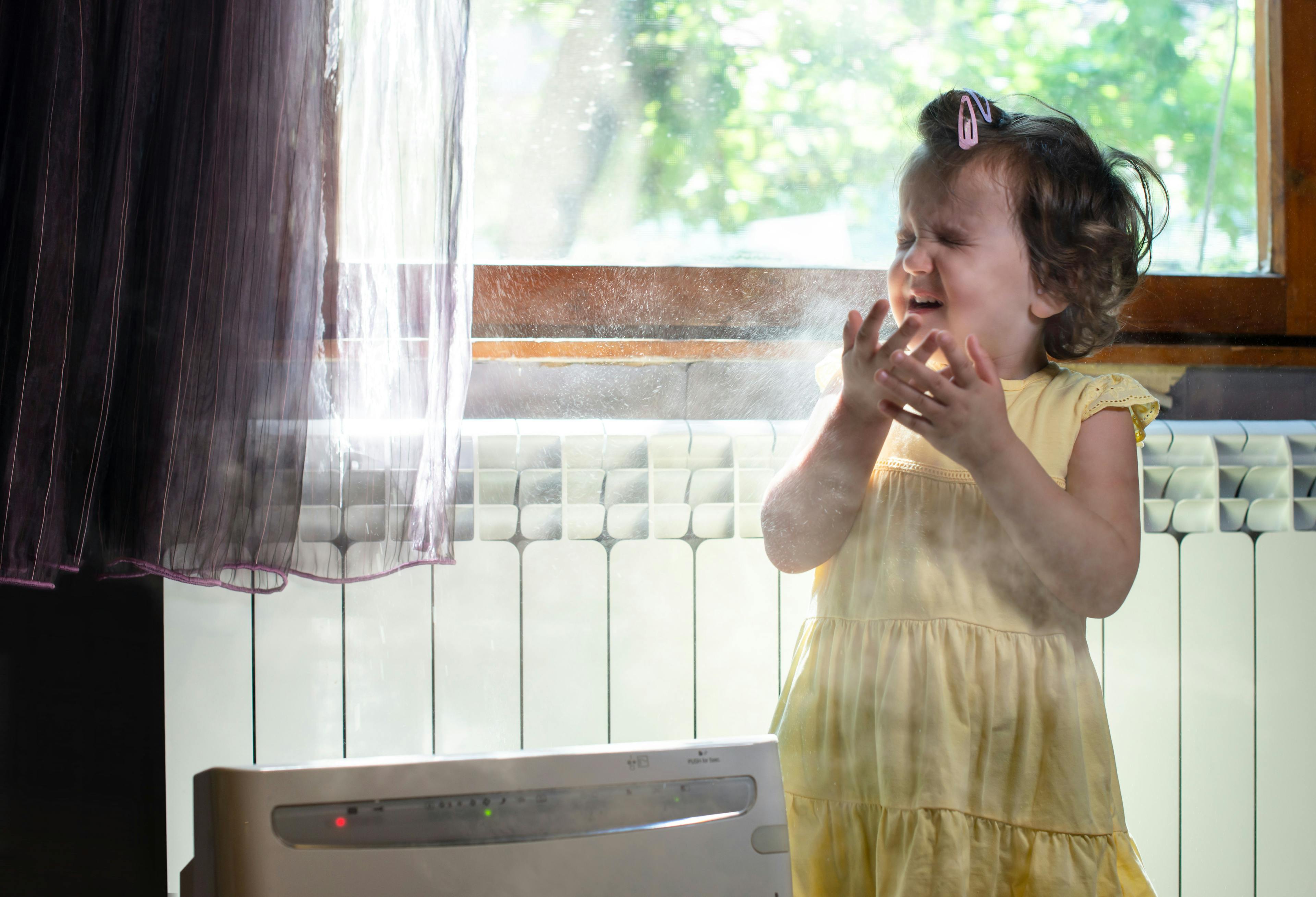 little girl in yellow dress inside in dusty environment | Image credit: ©Deyan Georgiev stock.adobe.com