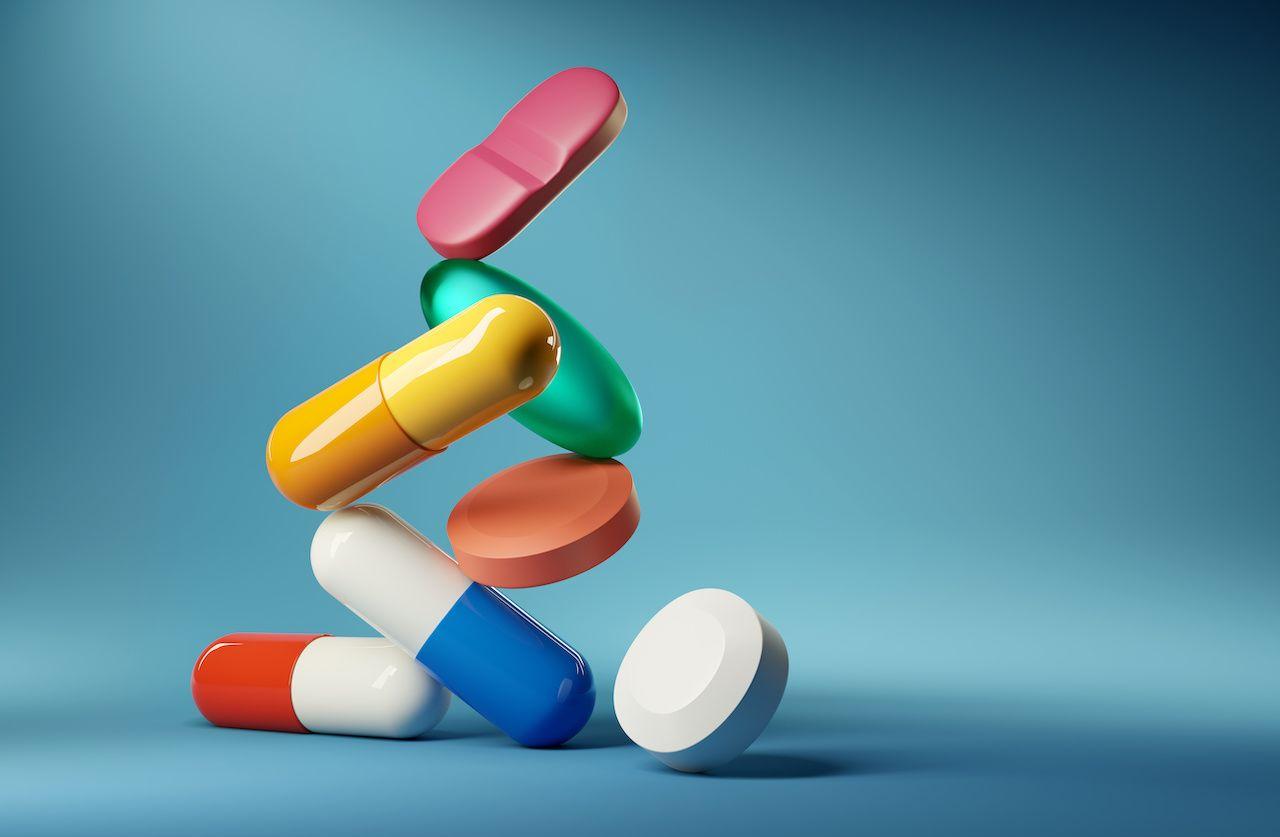 Pills balancing on top of each other | Image credit: James Thew - stock.adobe.com