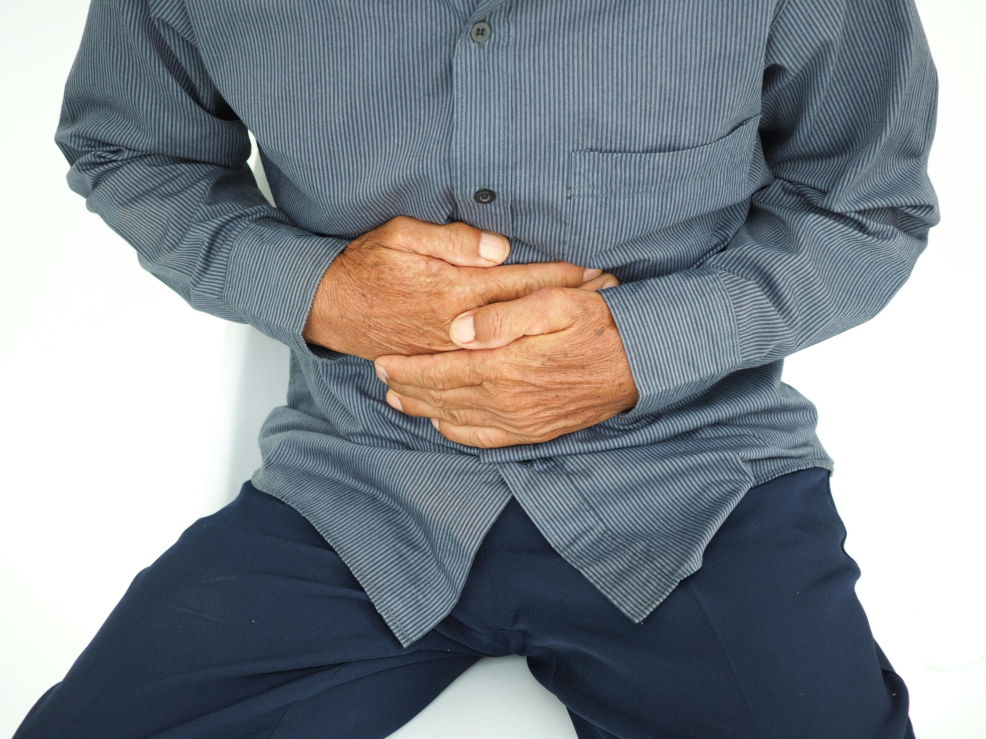 man holding stomach | Image credit: ©Bungon stock.adobe.com