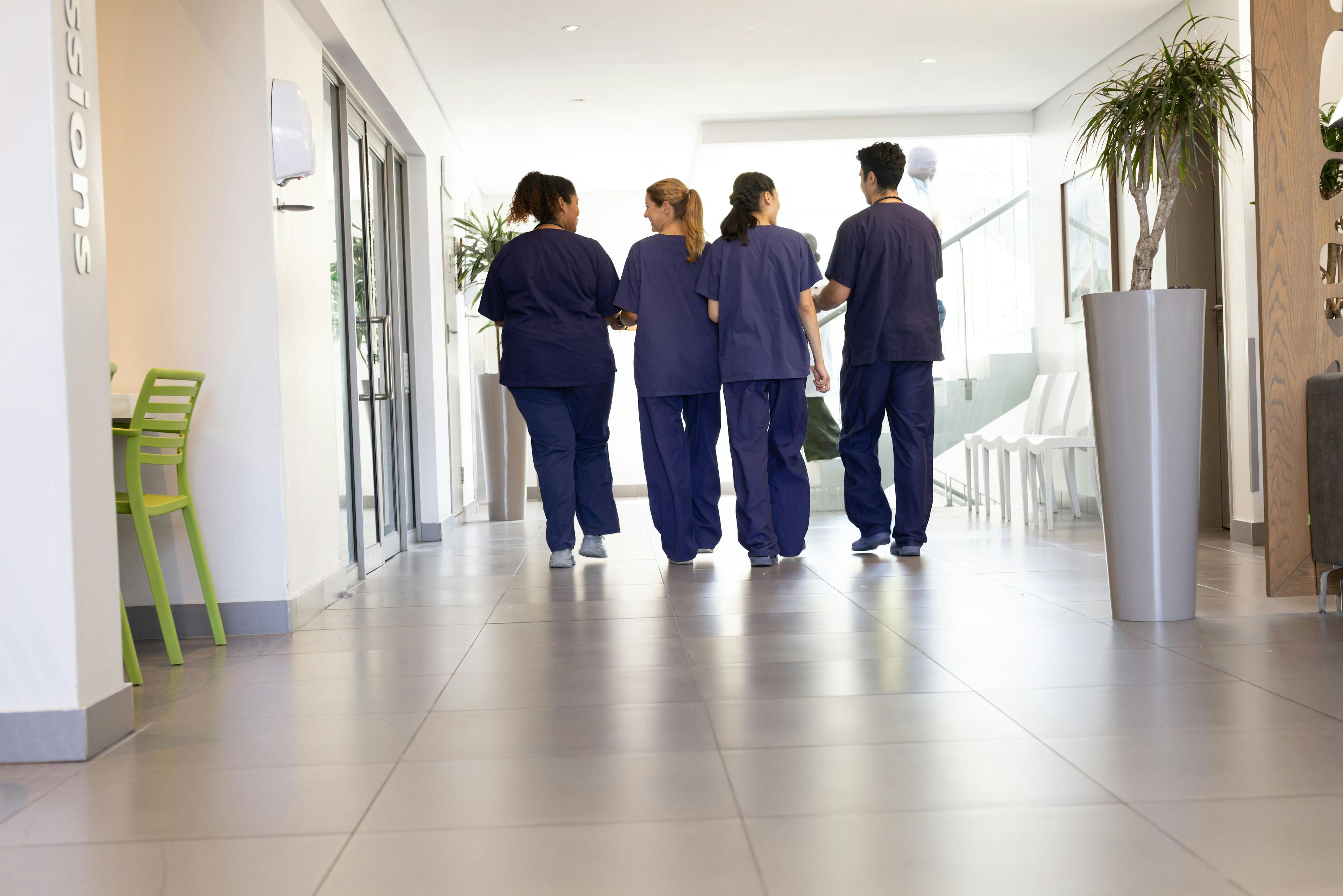 Four nurses walking down a hallway | Image credit: ©wavebreak3 stock.adobe.com